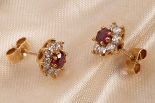 A pair of 18ct yellow gold diamond and ruby cluster earrings