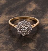 An 18ct yellow gold and diamond flower head cluster ring