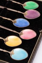 A cased set of six silver and enamel teaspoons