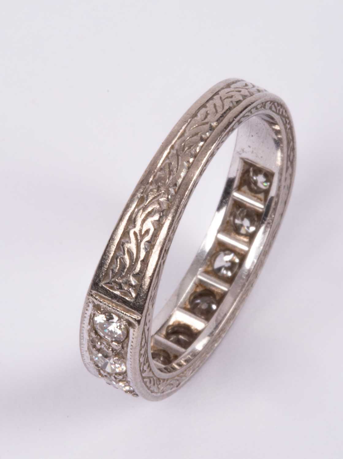 An 18ct white gold and diamond half eternity ring - Image 4 of 4