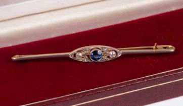 An Edwardian gold, sapphire and diamond bar brooch