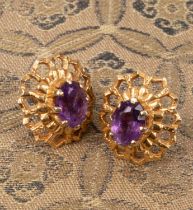 A pair of amethyst and 9ct gold ear studs