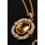 An 18ct gold, diamond and yellow sapphire pendant