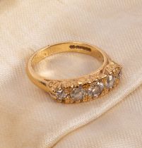 An 18ct yellow gold and diamond five-stone ring