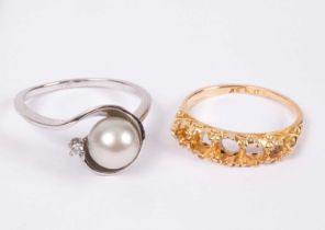 A 14ct white gold, pearl and diamond ring