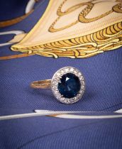 An 18ct yellow gold Art Deco style sapphire and diamond circular cluster ring