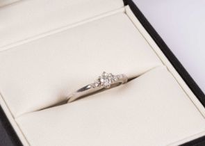 An 18ct white gold diamond three-stone ring