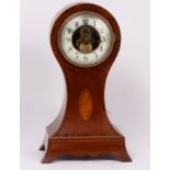 An Edwardian mahogany balloon-shaped mantle clock, cross banded and inlaid a satinwood shell,