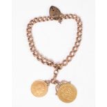 A 9ct rose gold curb-link bracelet hung with a spade Guinea and a 1907 gold sovereign,