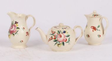 An English creamware globular teapot and cover, hot water jug and cover and milk jug,