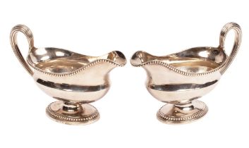 A pair of George III silver sauce boats, Andrew Fogelberg, London 1775,