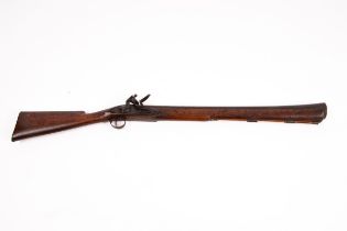 A flintlock duck gun, London Tower marks to the side plate, with ramrod, the barrel 64.