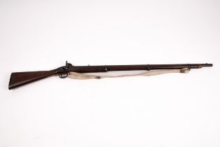 An Enfield percussion cap rifle with brass trigger guard and ring strap mounts,