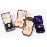 An Edwardian garnet and diamond dress ring set in 9ct gold, size N/O,