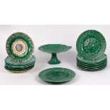 A collection of nineteen green-glazed pottery plates, late 19th Century,