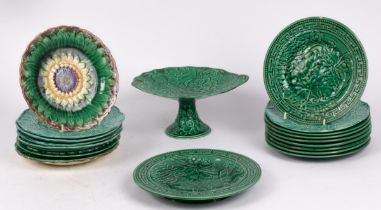 A collection of nineteen green-glazed pottery plates, late 19th Century,