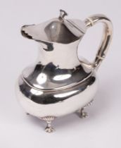 A silver water pitcher, Lee & Wigfull, Sheffield 1900, ovoid form with ivory heat absorbers, 16cm,