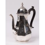 A silver coffee pot, Goldsmiths and Silversmiths Co Ltd, London 1924, baluster panelled form,