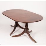 A mahogany twin-pedestal dining table,