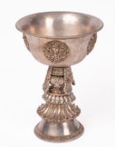 A Tibetan white metal butter lamp,