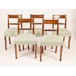 A set of six Regency mahogany dining chairs with light green upholstered stuff over seats