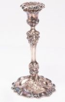 A Victorian silver candlestick, Benjamin Smith, 1867, initialled, chased with vines, weighted,