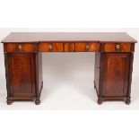 A mahogany sideboard fitted drawers and cupboards,