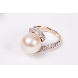 A pearl and diamond ring,