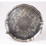 A large Victorian circular silver salver, Benjamin Smith, London 1867,