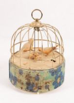 A 20th Century automaton of two singing white birds in a cage and another singing bird automaton