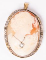 A cameo brooch decorated with the bust of a lady with a diamond set necklace,