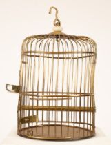A brass bird cage,