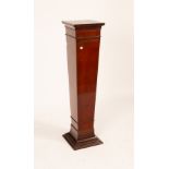 An Edwardian mahogany tapered pedestal with square moulded top and base,