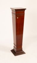 An Edwardian mahogany tapered pedestal with square moulded top and base,