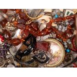 A quantity of costume jewellery to include two marcasite brooches, an Italian abstract cat brooch,