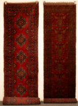 A Bokhara runner, Afghanistan, the deep red field with cruciform medallions,