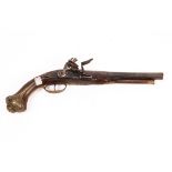 An 18th Century Eastern flintlock pistol with engraved barrel and gilt seal marks,