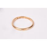 An Irish Victorian 18ct gold wedding band, approximately 1.