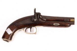 A double-barrel percussion cap pistol with engraved metal mounts and cap end,
