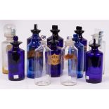 Three apothecary blue glass drug jars and stoppers, with gilt inscriptions, 25.