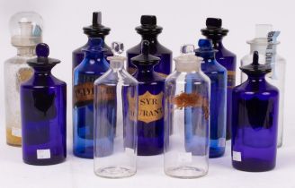 Three apothecary blue glass drug jars and stoppers, with gilt inscriptions, 25.