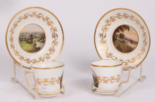 A pair of Derby topographical coffee cups and saucers, each painted with a titled local scene,