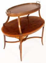 An Edwardian mahogany two-tier tray table, crossbanded and with inlaid border and supports,