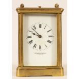 A gilt brass cased carriage clock with repeat mechanism,
