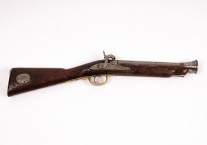 A percussion cap blunderbuss, with brass trigger guard and steel ramrod,