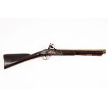 A flintlock blunderbuss with brass barrel and engraved side plate with ramrod, the barrel 40.