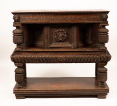 A Victorian carved oak court cupboard, the top with chequered frieze,