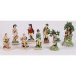 A group of eight English pearlware figures,