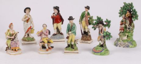 A group of eight English pearlware figures,