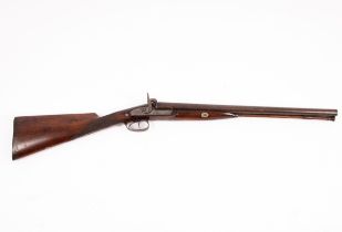 A double-barrel muzzle loading shot gun with Damascus barrels and ramrod,